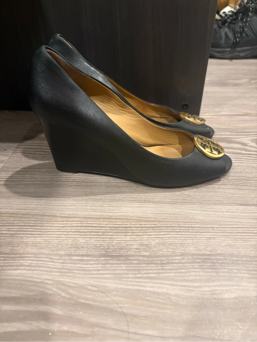Tory Burch Black Leather Peep-Toe Pumps with Gold Logo Medallions